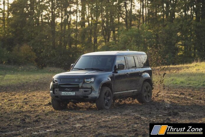 Behind the scenes image of the New Land Rover Defender featured in No Time To Die - 1