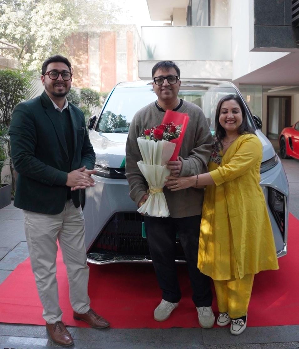 Ashneer Grover taking delivery of MG M9